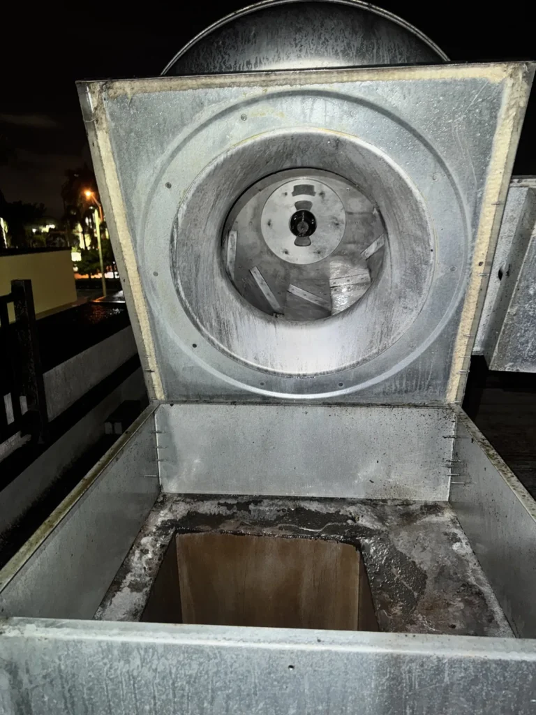 Kitchen exhaust fan after cleaning with the housing open