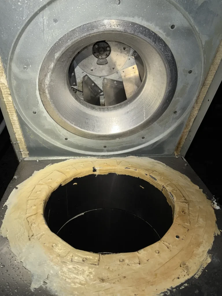 Rooftop kitchen exhaust fan housing and blades after cleaning